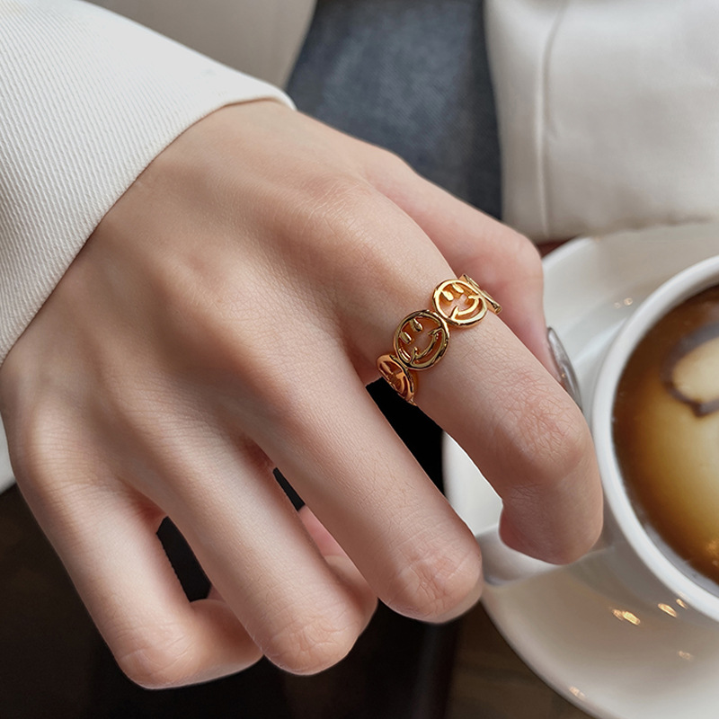 European and American new cute hollow smiley silver plated copper ring female