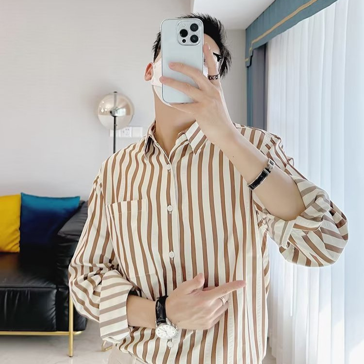 Camisa de primavera y otoño Chaqueta delgada de lujo ligera para adolescentes Camisa casual de negocios de manga larga a rayas verticales para hombres