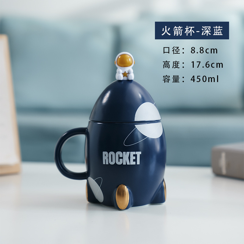 Taza de cerámica de cohete de dibujos animados Taza creativa con cuchara de tapa Taza de café de leche de dibujos animados lindo ins de alto valor