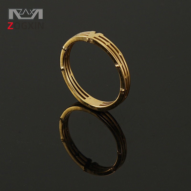Customized European and American ins niche design hollow ring men's cross-border stainless steel 18K gold jewelry ring wholesale