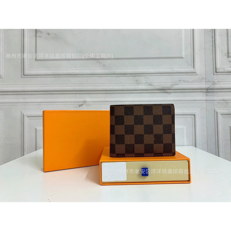 Cartera de moda de hombre transfronteriza europea y americana corta billetera de cuero real plegable para mujeres embalaje de cartera de suministro de comercio exterior Q217