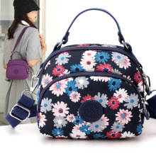 新款尼龙印花布潮时尚单肩斜挎手提包户外休闲妈咪包手机包6603
