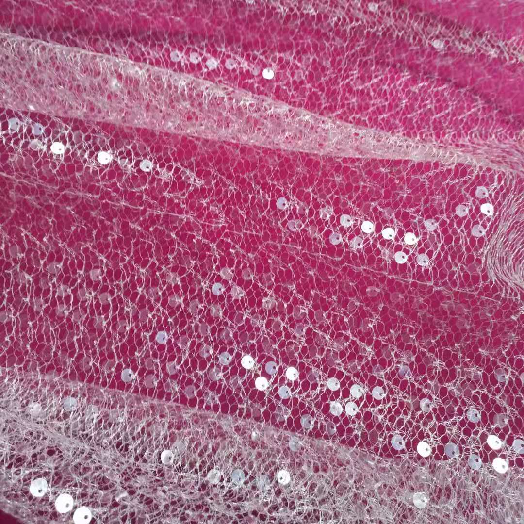 现货供应~爆款乱网闪亮重工单孔绣片 装饰布婚纱礼服舞台装等面料