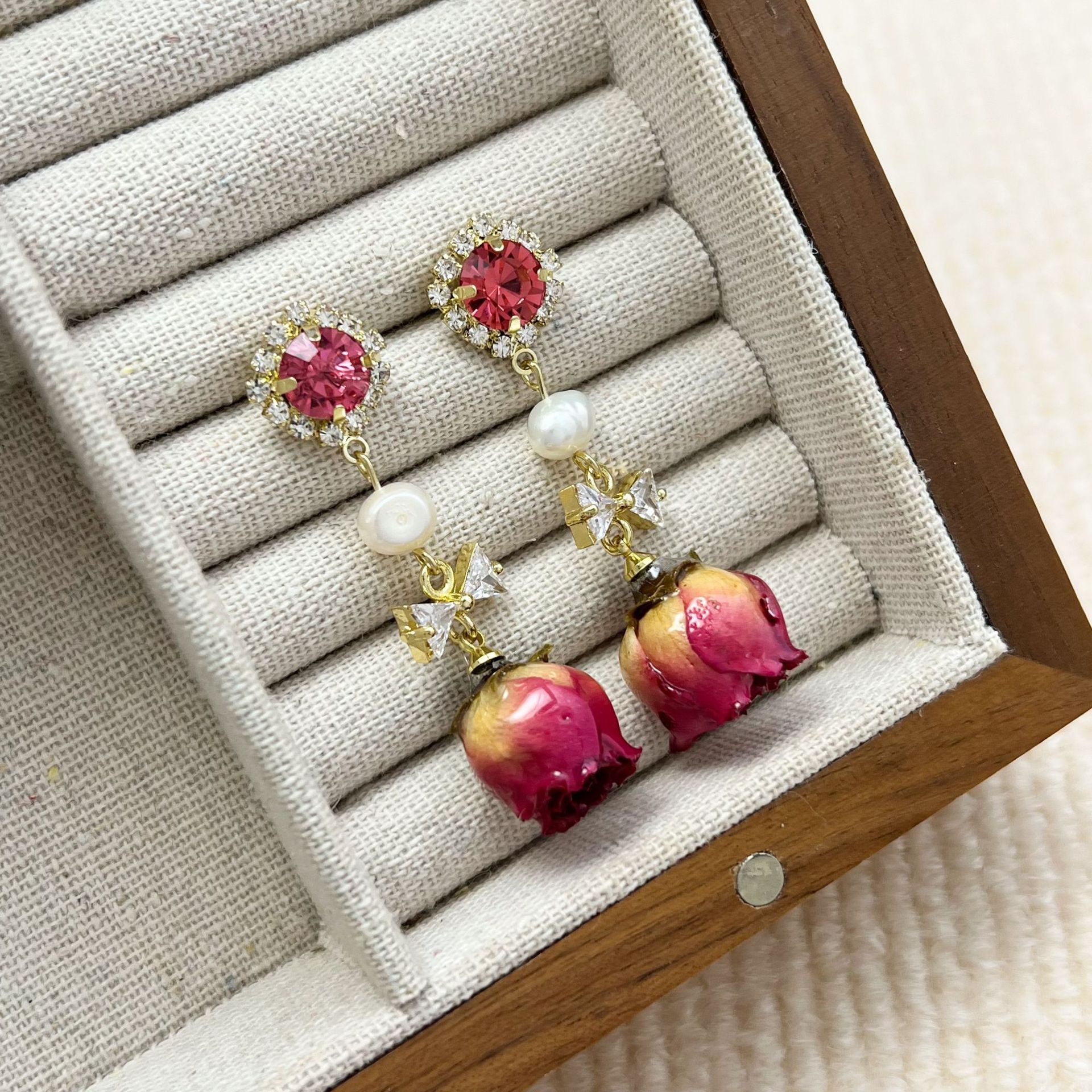 Retro earrings with zircon with bow from pearl