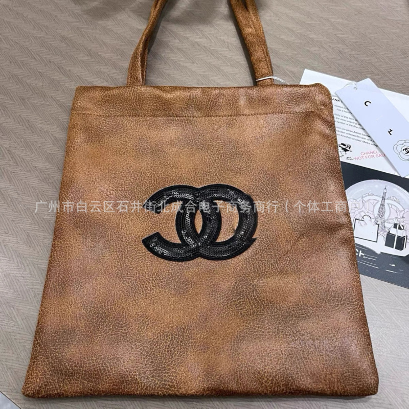 跨境爆款员工uniform渲染棕色亮片标志帆布单肩腋下女包学院现货|undefined