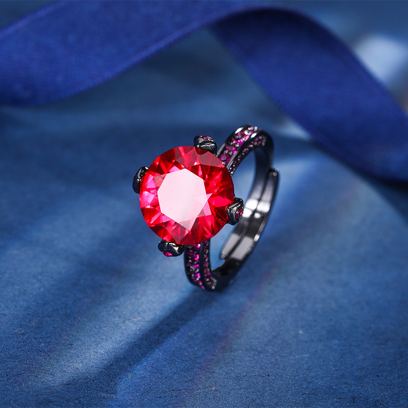 2024 Nueva Zhuang Sheng joyería de cobre de fondo chapado en oro de simulación corindón redondo anillo de personalidad de Oro Negro femenino 12mm