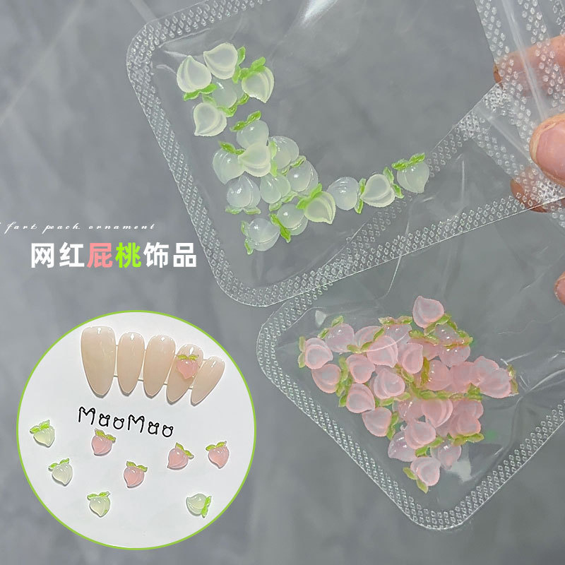 Nail art fart peach jewelry Net red three-dimensional fart peach heart finished color love cute with leaves nail accessories wholesale