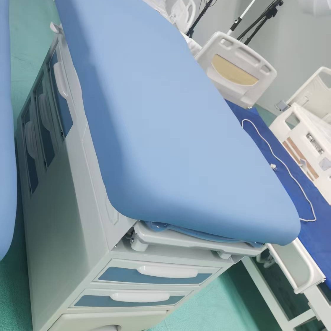 Cama de examen ginecológico americana, cama de diagnóstico hospitalario con cajón, cama de examen ginecológico con pedal, cama de diagnóstico ginecológico multifuncional image 3