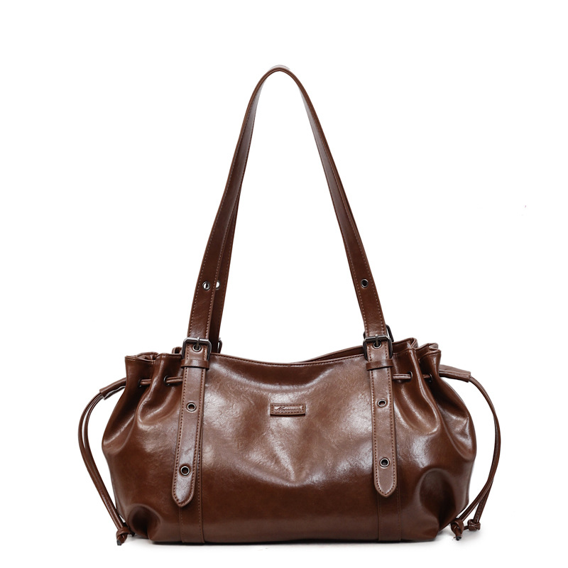 Bolso de gran capacidad para mujeres 2025, nuevo cross-border retro mochila de hombro de textura superior, bolsa de transporte de ocio