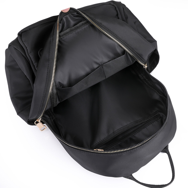 2024 nueva mochila casual de nailon de color sólido para mujer, mochila de viaje de gran capacidad para viajes al aire libre simple y de moda