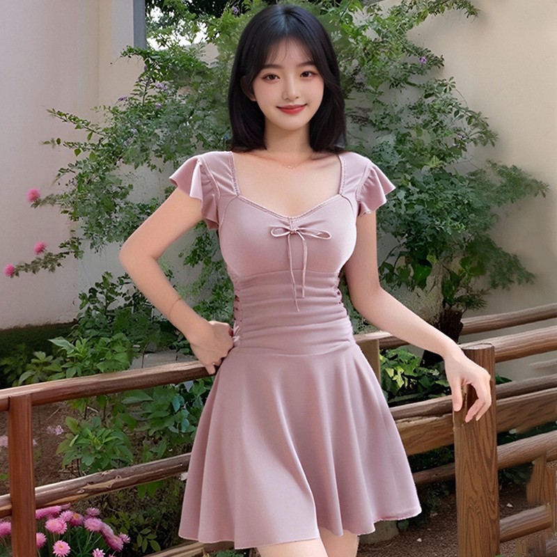 Traje de baño de una pieza para mujer 2025 nuevo color sólido dulce y lindo conservador ligeramente gordo que cubre la carne traje de baño de vacaciones de aguas termales al por mayor