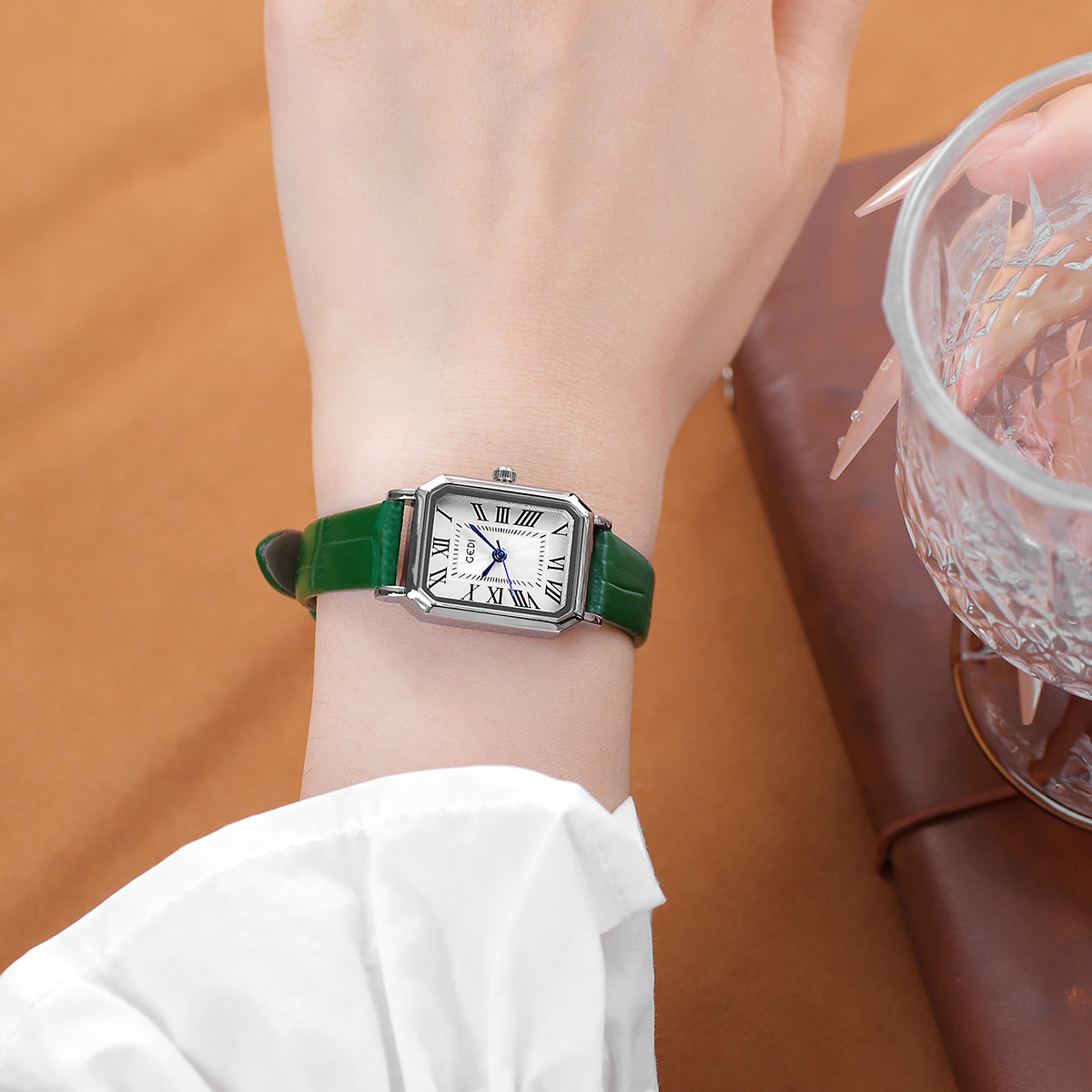 Silver shell white surface green belt