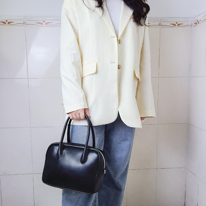 Design di nicchia coreano con la stessa borsa color crema e una borsa elegante, borsa quadrata con croce diagonale a spalla singola_voghion.com