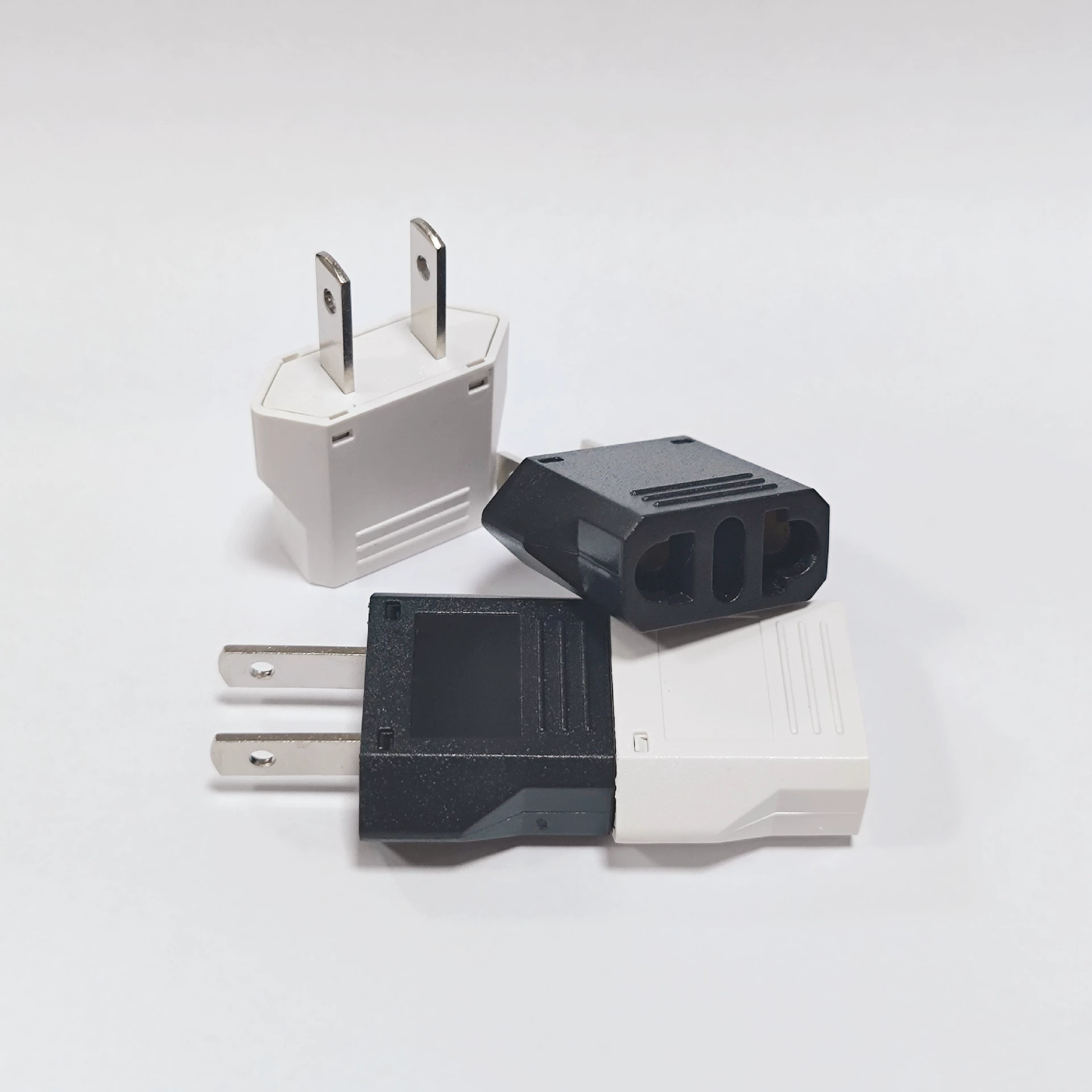 BX-9121-1 два плоских американских конверсионных штекера из США в Австралию в США в Европу с отверстиями из Европы в США.