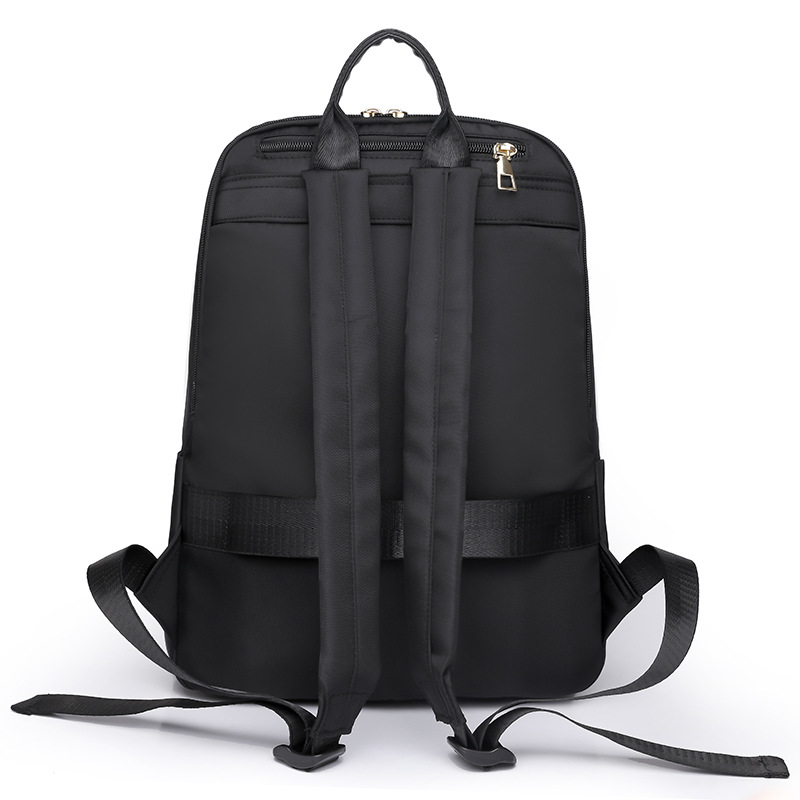 2023 verano nuevo estilo versión coreana de la mochila de nailon para mujer simple y versátil mochila para computadora ligera de gran capacidad al por mayor