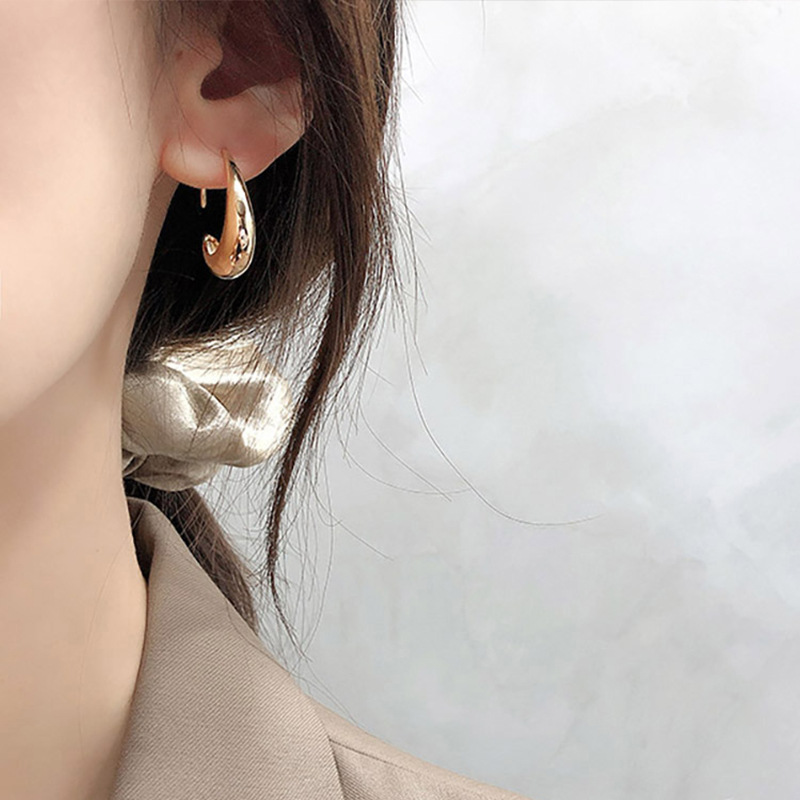 S925 aguja de plata elegante pendientes de nicho femenino diseño de gama alta pendientes populares pendientes de perlas pendientes únicos al por mayor