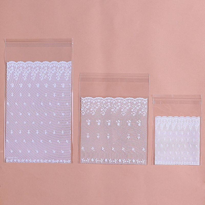 100个批发 白色蕾丝网状婚纱款礼品包装袋 饰品袋 糖果袋10*15+3