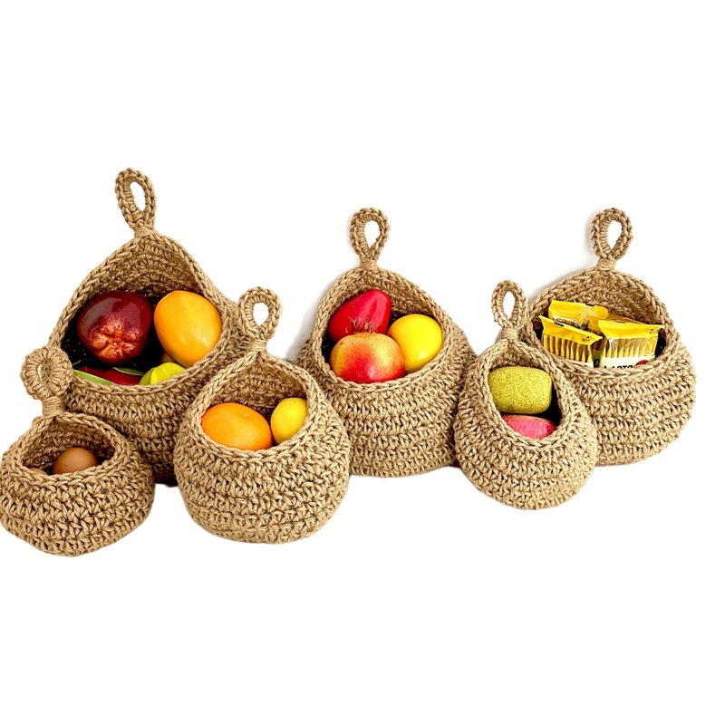 Cross-border popular montado en la pared cesta de frutas bolsillo de vegetales colgando cuerda de algodón de Orquídea cuerda de cáñamo tejido maceta cesta de flores