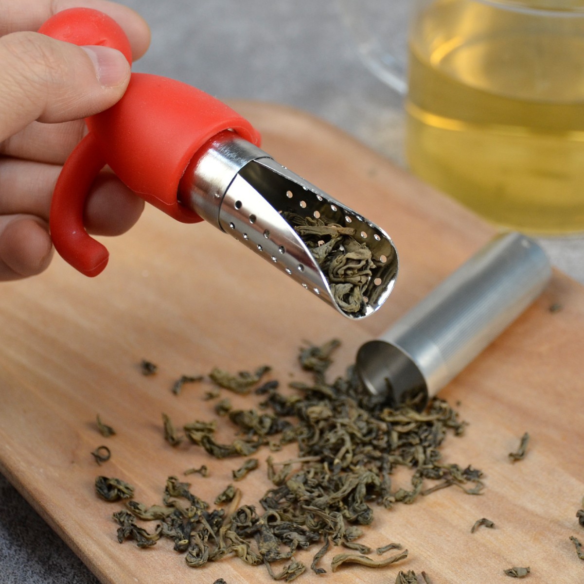 Colador de té creativo de acero inoxidable con cuchara de té colgando portátil de silicona en forma humana fabricante de té al por mayor lindo Filtro de té