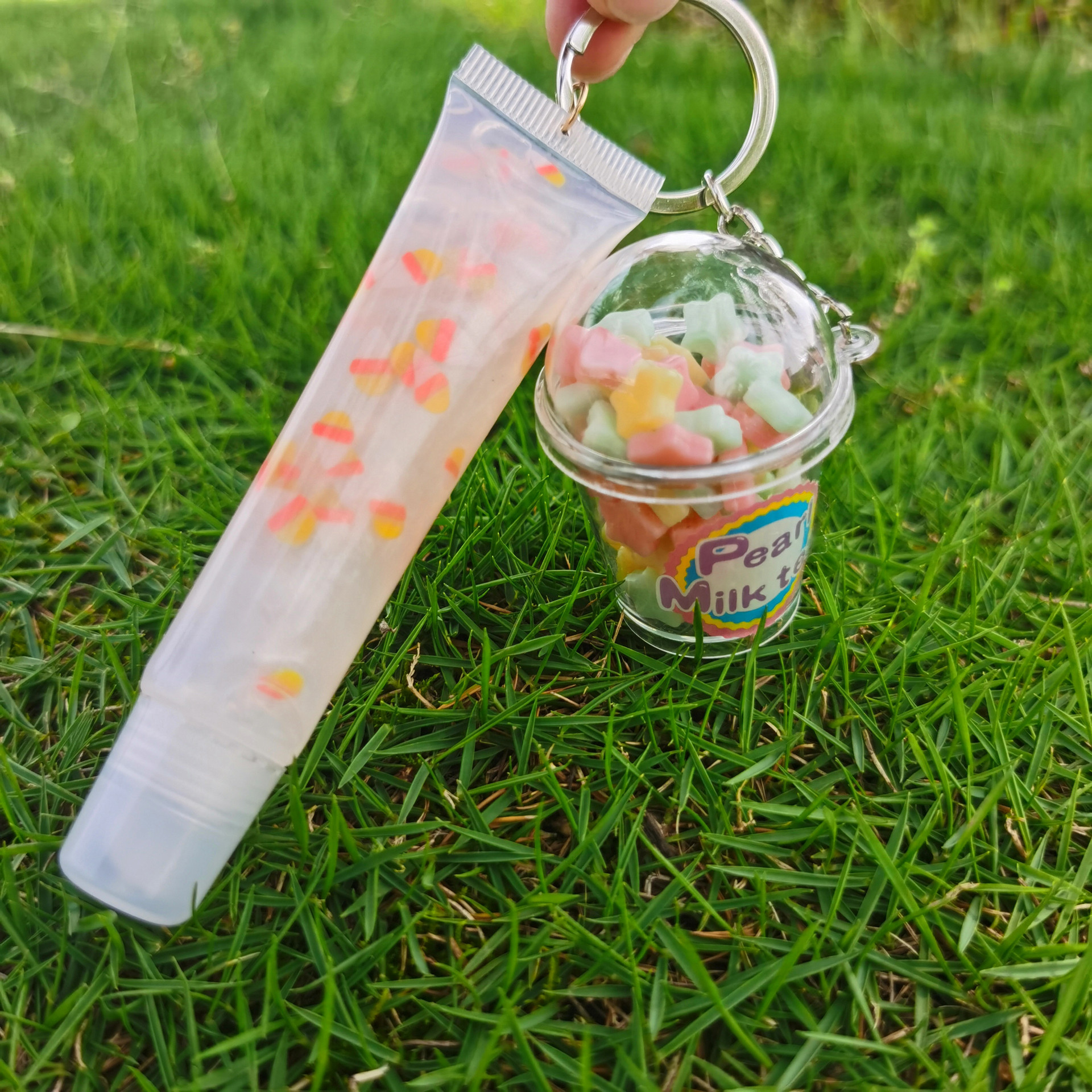 Shangxin niños cosméticos mecedora música llavero colgante tropical fruta niños piel bola colgante labio esmalte no lo