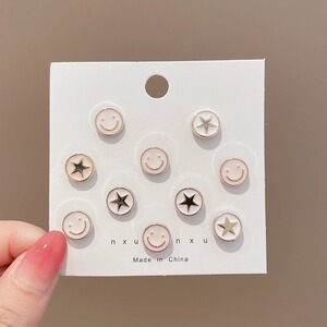 Pantalones de jeans de cintura, botones de cintura ajustados, botones ajustables fijos