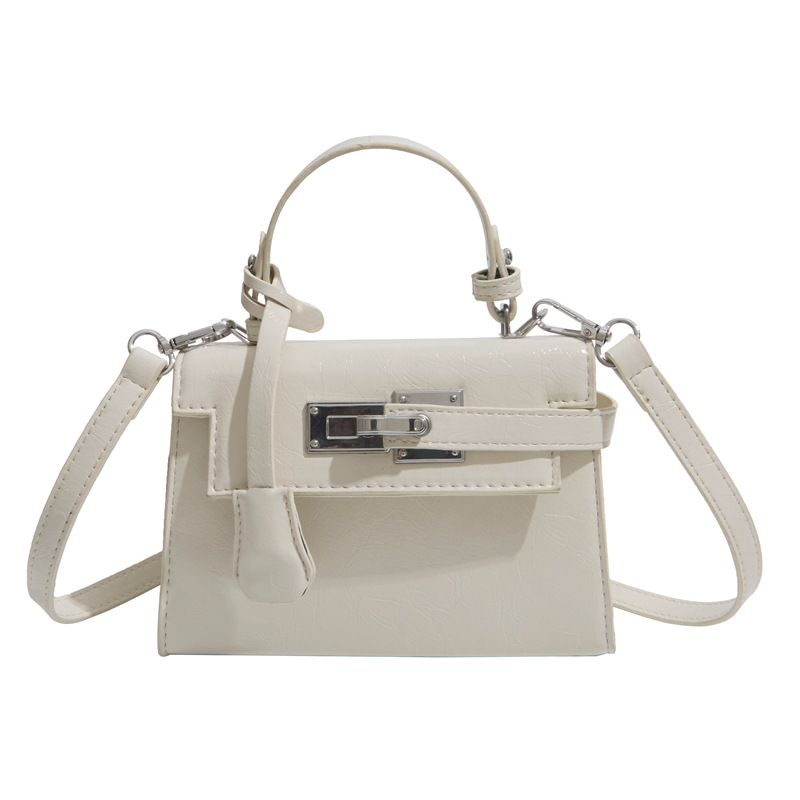 Nicho de diseño Kylie bolso mujer 2026 nuevo bolso pequeño bolso portátil mochila simple sensación cotidiana de viaje bolsa de hombro