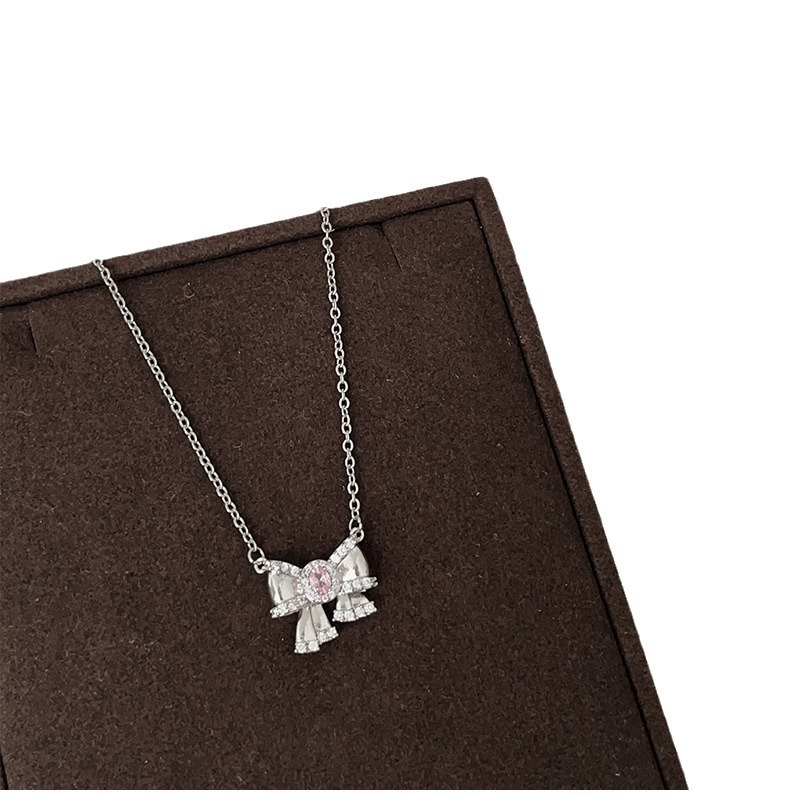 Fuchsia small necklace with zircon with bow