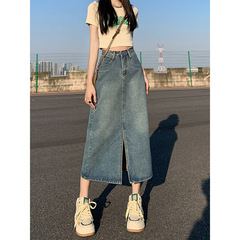 背の高い腰のデニムの半身のスカートの女性の夏の新型の韓国系のナシの形は股を遮って見えて痩せています。