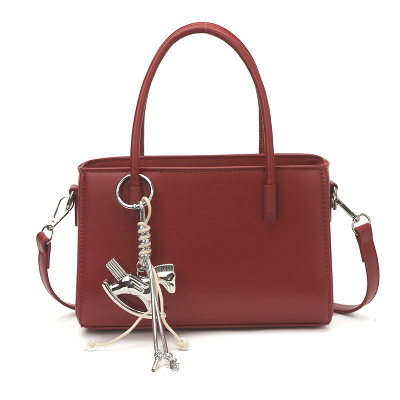 Diseño coreano de nicho bolso de mano casual para mujeres 2026 verano diario nuevo estilo de moda bolso de transporte