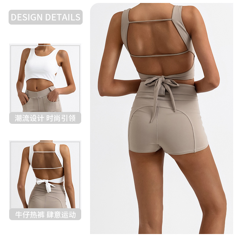 Traje de fitness de yoga transfronterizo de la belleza de la espalda de las mujeres con almohadilla en el pecho chaleco deportivo cintura alta melocotón pantalones cortos de entrenamiento de cadera conjunto de dos piezas