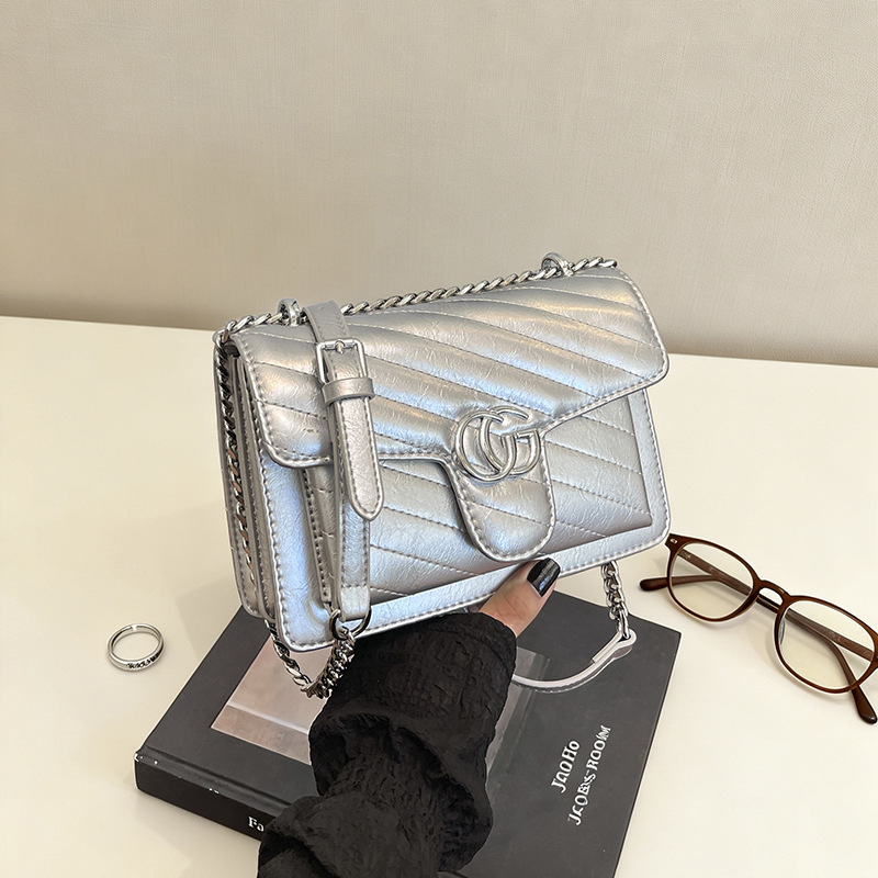 Comercio exterior bolso de explosión simple retro ondulado bolso de amor bolso de hombro para mujeres sensación de diseño de lujo ligero