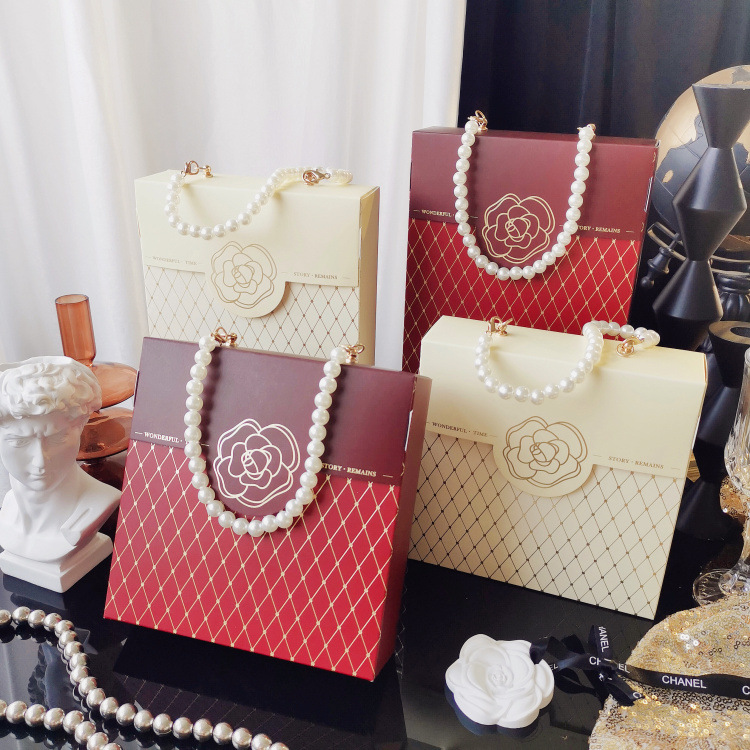 山茶花小香风礼盒小红书同款结婚喜糖盒子空盒阿胶糕花茶手提盒