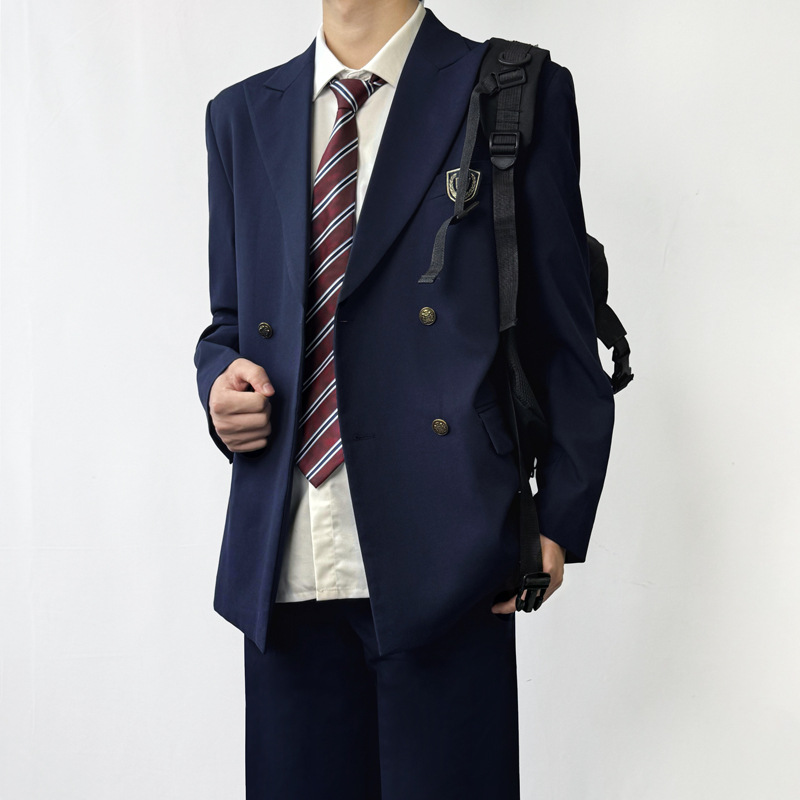청록색 정장 재킷(배지 포함)