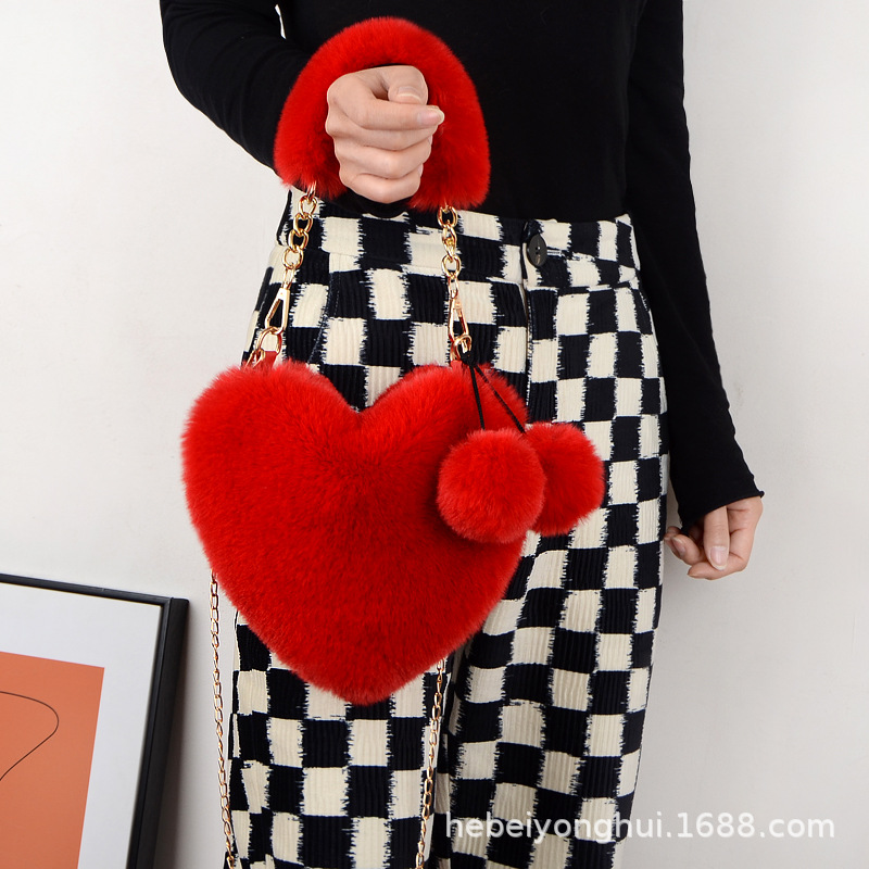 Fabricante en stock bolsa de corazón de melocotón portátil moda felpa en forma de corazón bolsa de peluche bolso de las mujeres