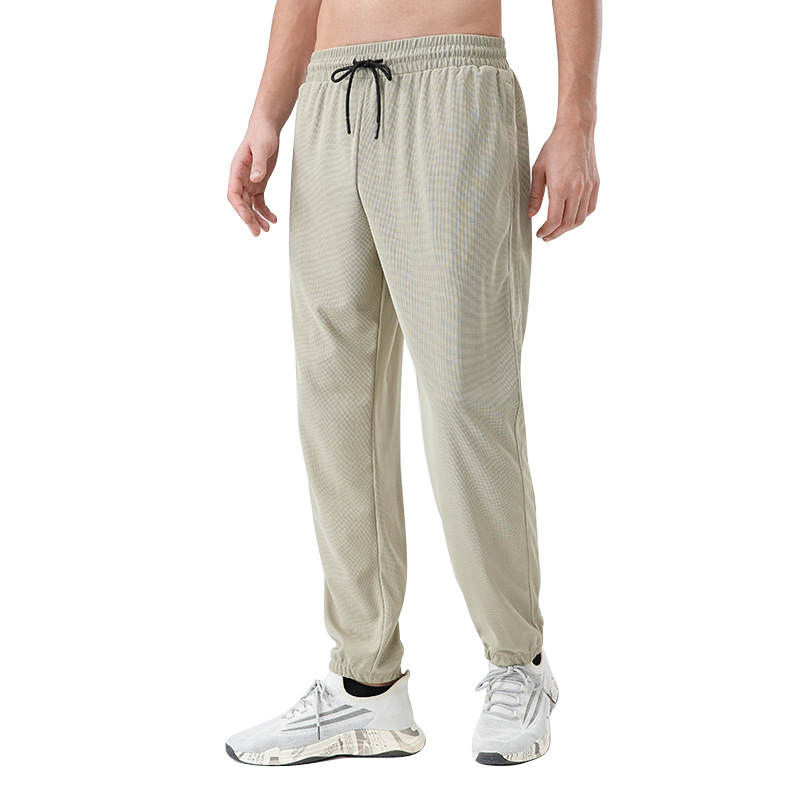 Pantalones deportivos de tejido para hombres respirantes absorbientes de humedad secado rápido entrenamiento de maratón de atletismo para correr pantalones casuales