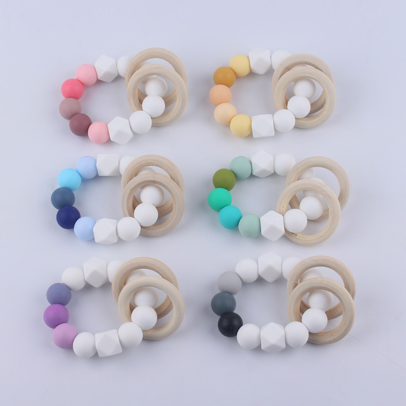 Nuevos suministros para bebés Cadena de chupete DIY creativo contraste color cuentas de silicona mordedor anti-caída traje de cadena