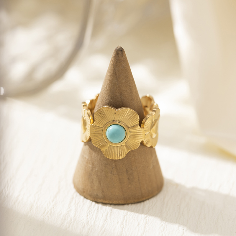 TENA francés oro turquesa 18 quilates anillo de acero inoxidable de mujeres de alta calidad anillo de acero de titanio flor transfronteriza