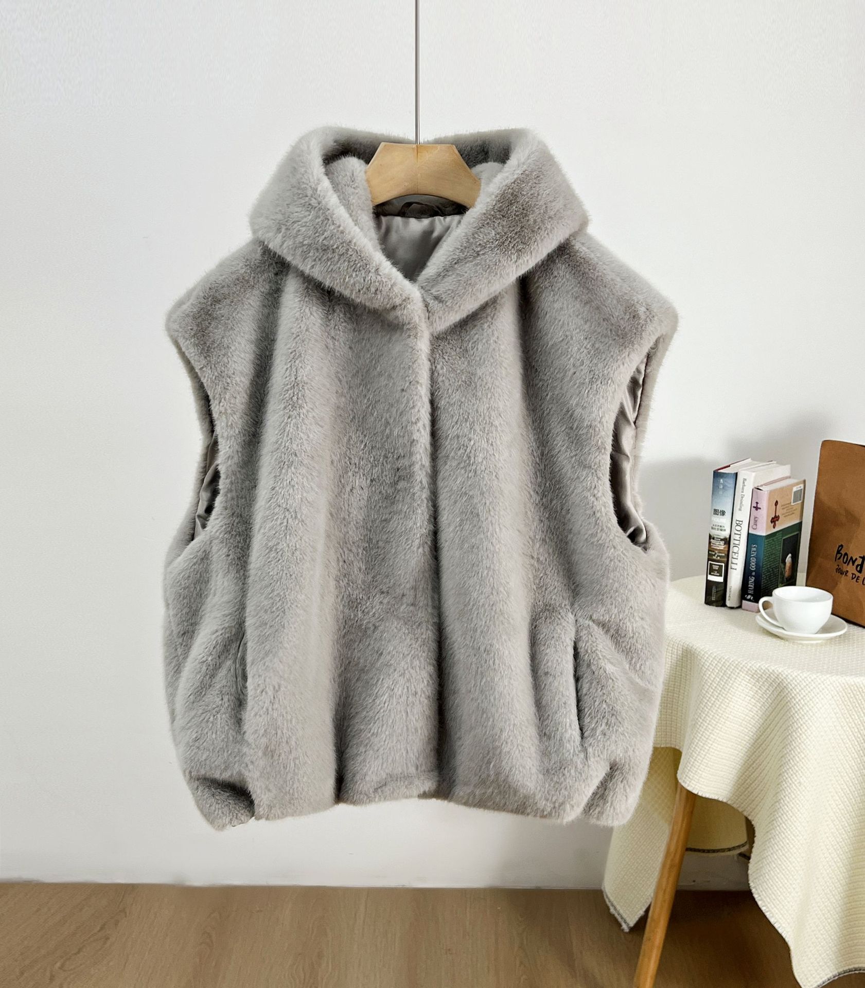Primavera nuevo chaleco con capuzas de imitación de chaleco de botón una chaqueta de moda al por mayor corta