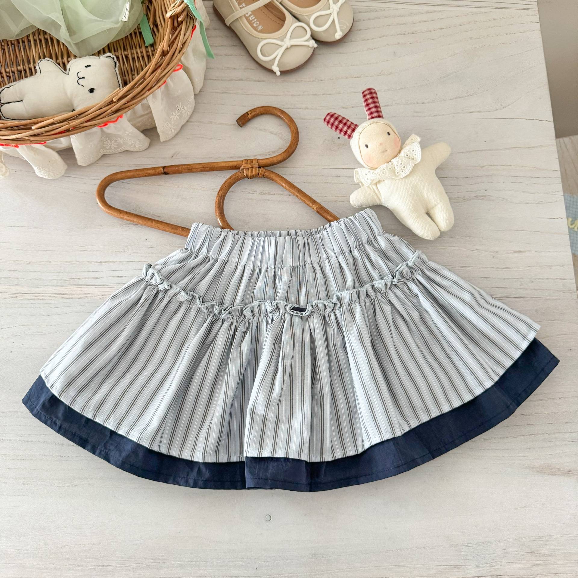 Falda de siete niñas de limón salado, verano nuevo estilo, falda de estilo occidental para niños, falda corta de todo fósforo para niñas, falda de botones florales