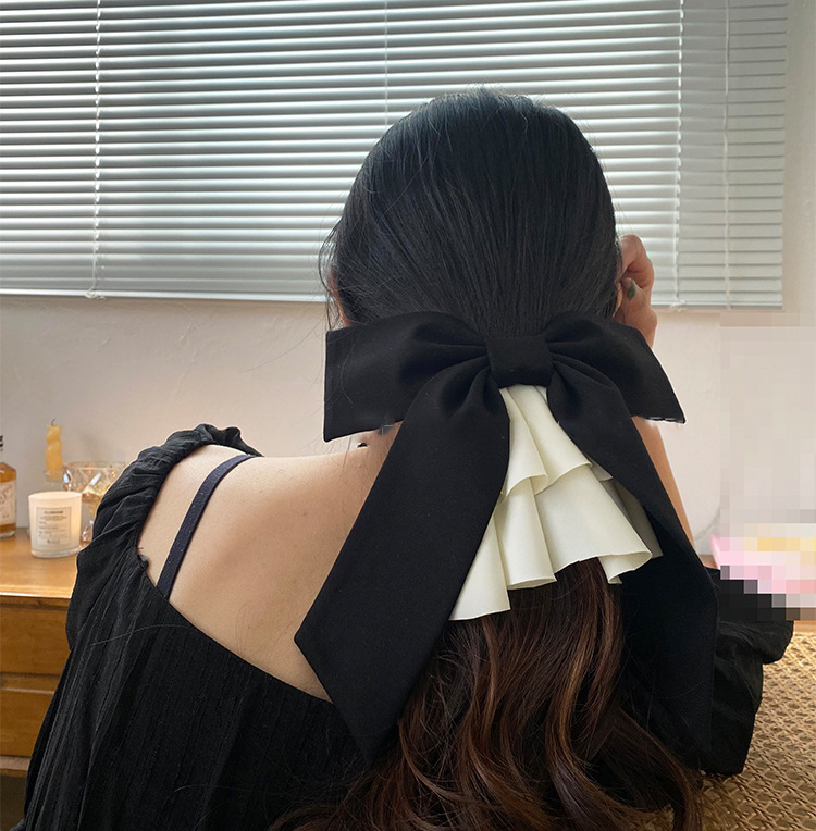 Fermaglio per capelli con fiocco in raso accessorio elegante_voghion.com