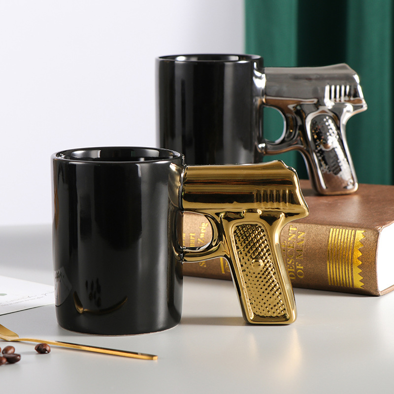 Taza de cerámica creativa oro plata pistola taza de mango de la pistola taza de agua personalizada taza de café taza de modelado 3D taza de esmalte taza