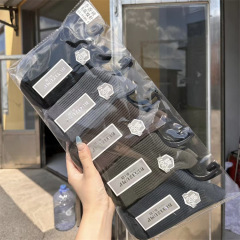 Buyiyuzhu メンズ秋冬二重針厚手ミッドカーフコットンソックスカジュアル無地黒と白の縦縞通気性ソックス卸売
