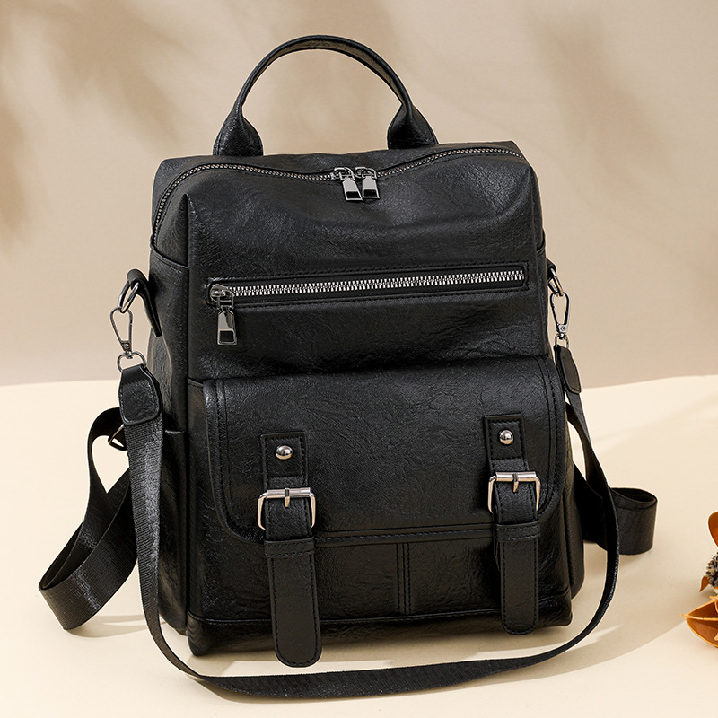 Inventario al por mayor transfronterizo nuevo estilo coreano retro mochila de mujer moda mochila de viaje multifuncional de cuero suave