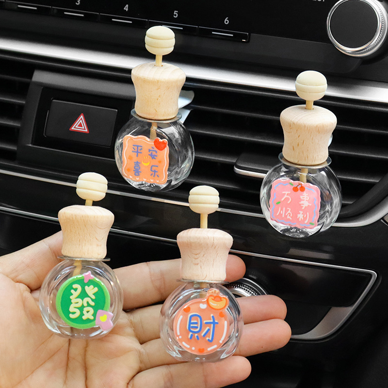 Clip de aromaterapia de coche, texto auspicioso, botella vacía, botella volátil, decoración de salida de aire de coche, fragancia de coche linda de dibujos animados