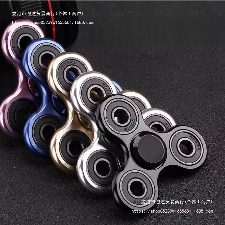Copper rotating spinning top for finger