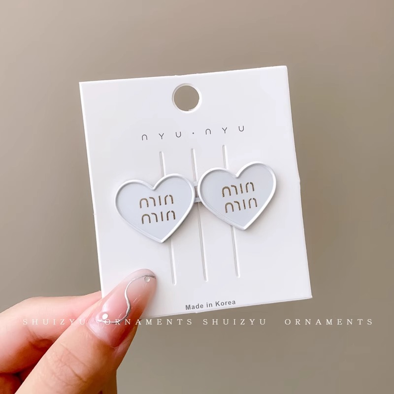 Vaqueros cintura en forma de corazón que adelgaza artefacto cintura sin costuras apretando hebilla ajustable cintura cambio grande botón pequeño PIN fijo