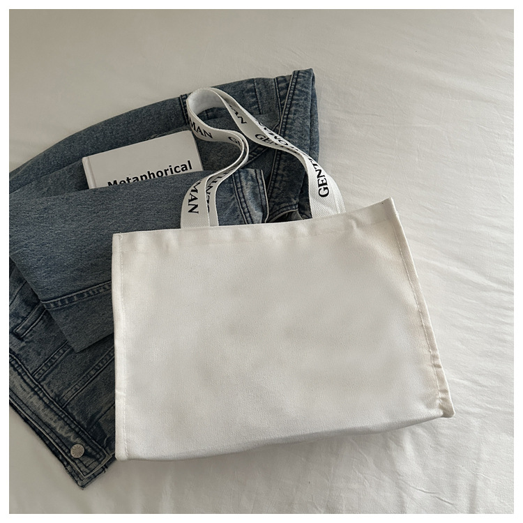 Large-capacity letter canvas bag 2025 new style ins printed versatile shoulder bag for commuting and portable ladies' tote bag undefined