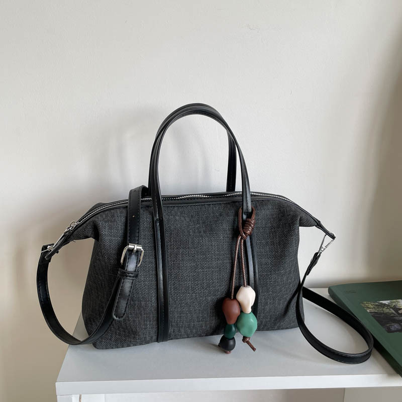 Bolsa de mano de gran capacidad de viaje coreano para mujeres 2026 nueva moda de verano simple bolsa de hombro retro