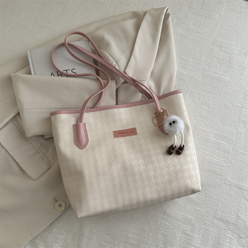Bolso de mano de viaje al trabajo 2024 primavera nuevo bolso de ocio universal bolso de hombro brazo bolso de mano coreano
