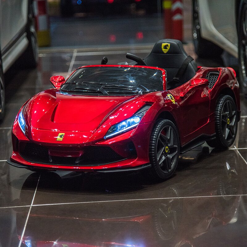 Carro eléctrico para niños se puede sentar en un coche de cuatro ruedas para bebés de 3 - 6 años de edad, carga de control remoto simulación de juguetes exportación